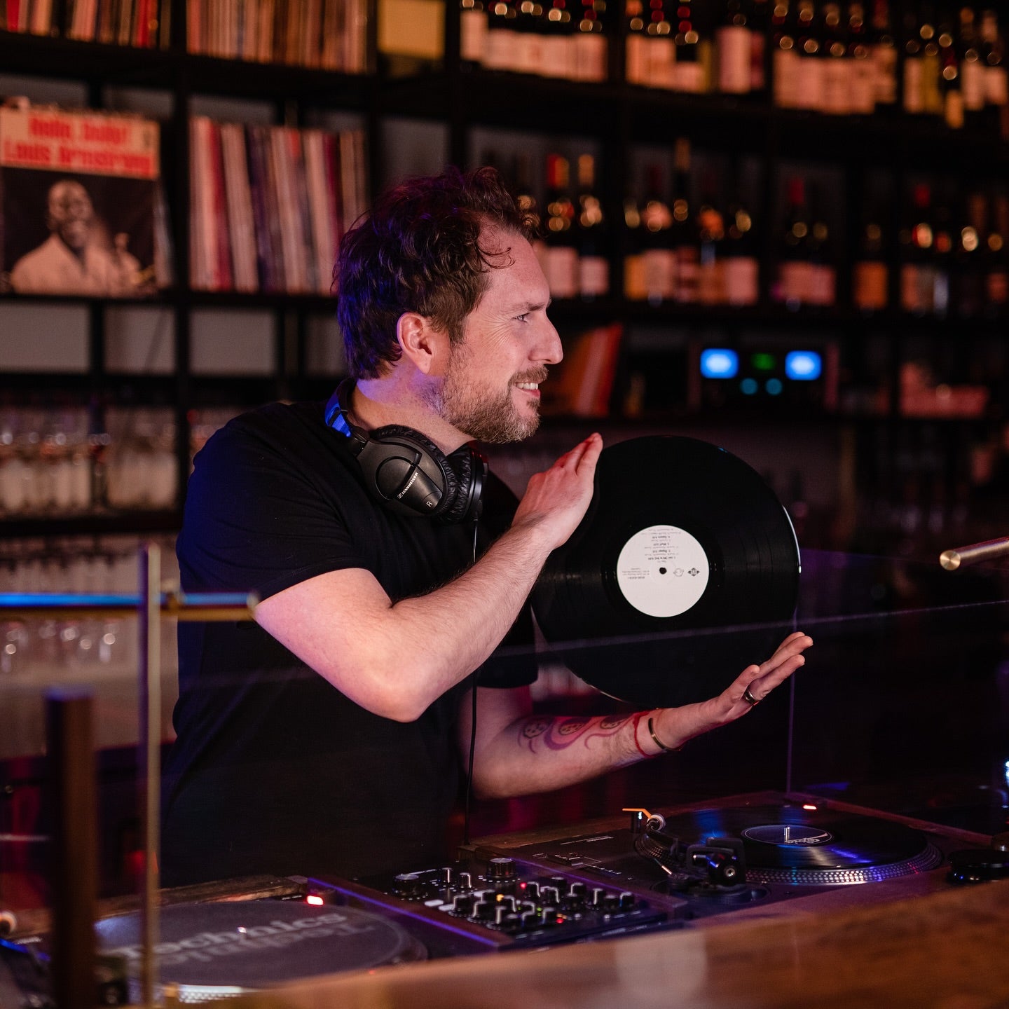 Man holding a vinyl record